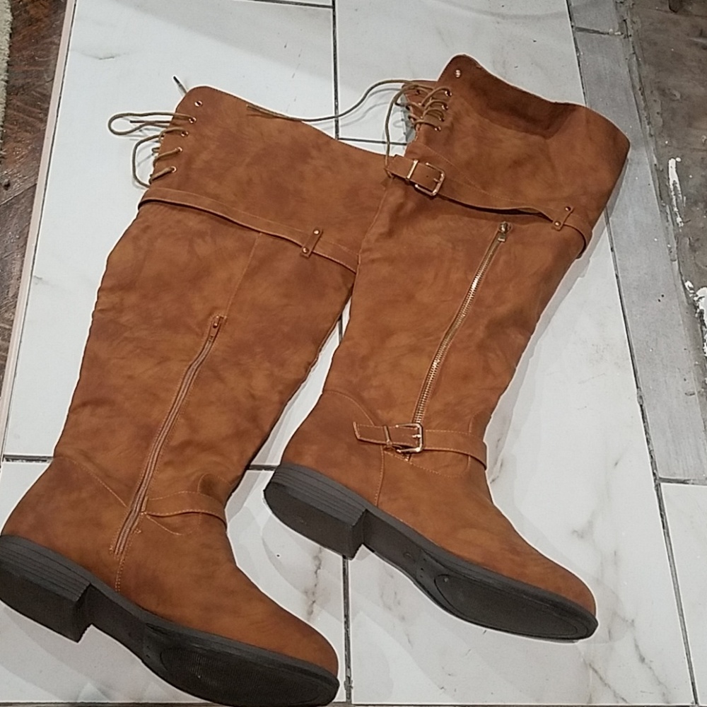 Size 12W over the knee boots